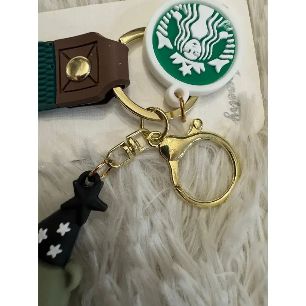 Starbucks bear keychain star hat white Starbucks logo green overalls wand
